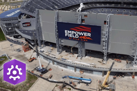 3D-Szene einer Arena mit dem Logo von ArcGIS Maps SDK for Native Apps in der unteren linken Ecke