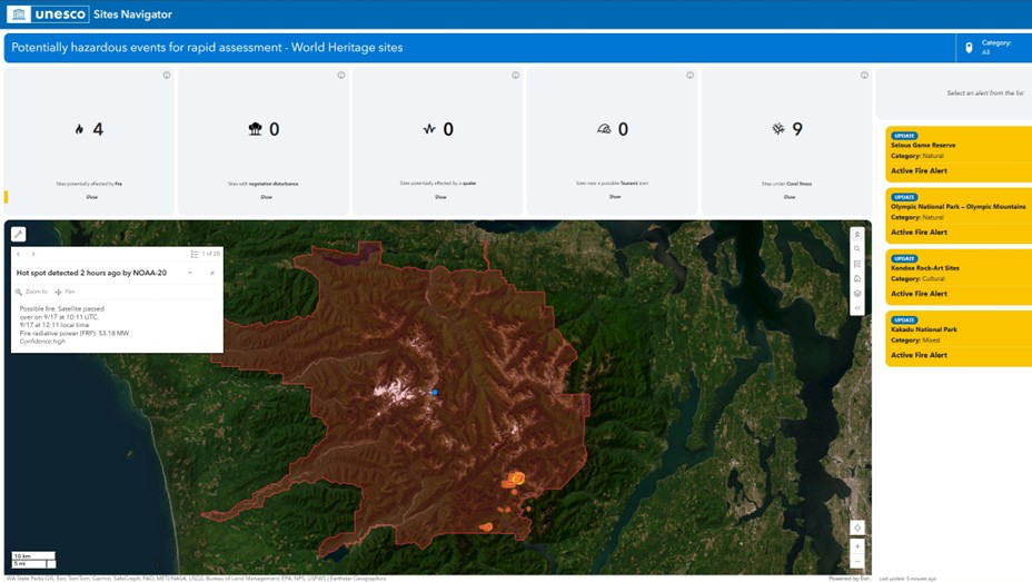 Dashboard im UNESCO Sites Navigator mit Karte eines Waldbrandgebiets, Statusübersicht und aktuellen Warnmeldungen.