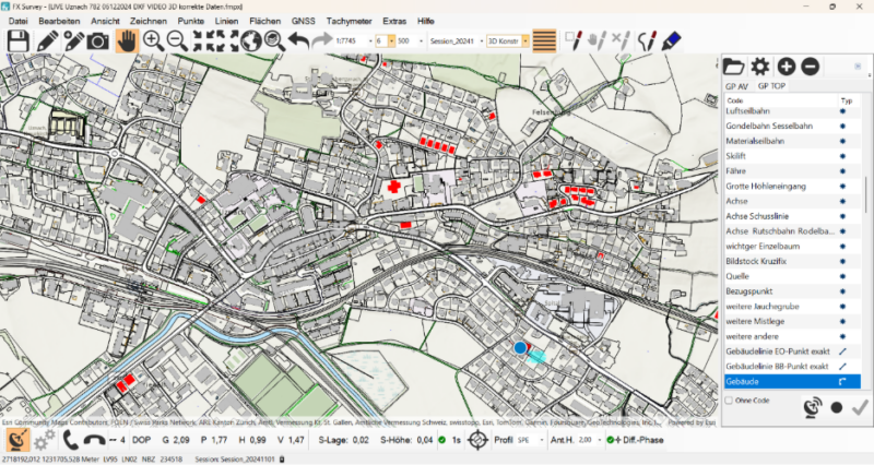 Übersichtskarte in einer GIS‑Anwendung mit Straßennetz, Gebäudestrukturen und markierten Objekten in einem bebauten Gebiet.