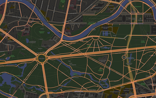 Dunkle OpenStreetMap-Karte mit hervorgehobenen Radwegen in Orange, Straßenkreuzungen sowie Grünflächen und Gewässern.