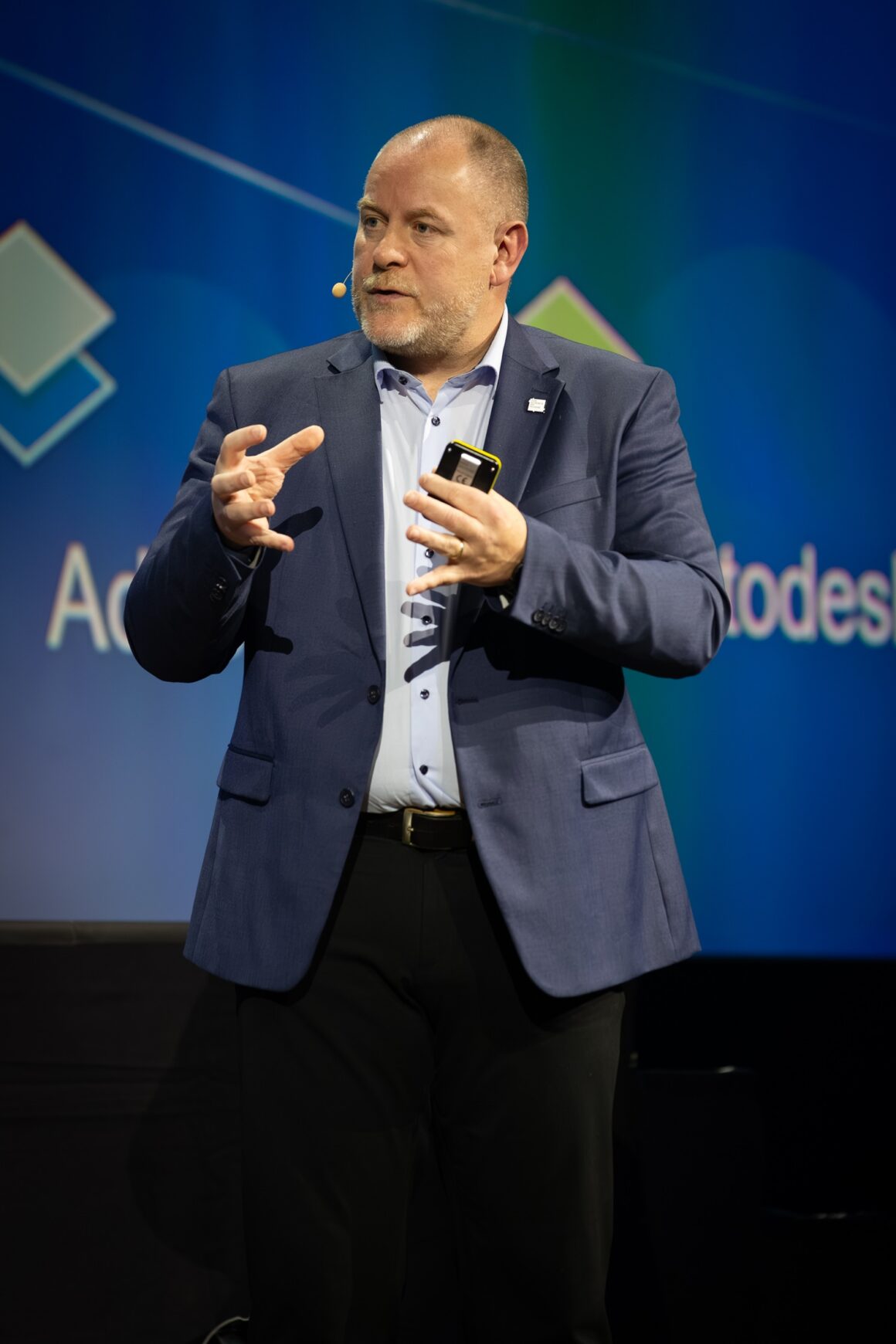 CTO Marko Prisky auf der Bühne der Esri Konferenz 2025